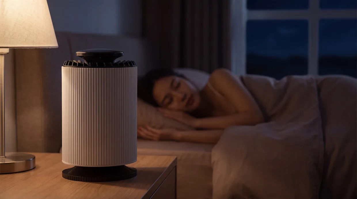 CloudPure running quietly on the bedside table of a dim, calm bedroom at night